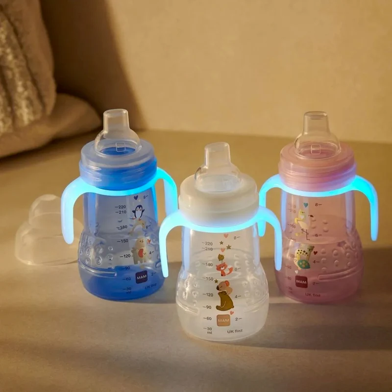 MAM Trainer Night kubek niekapek 2 ustniki i święcące uchwyty 220 ml 4 m+