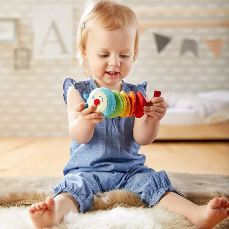 HABA składająca się i drżąca gąsienica Mina 18 cm 6 m+