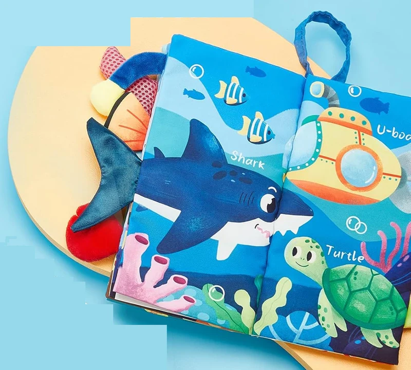 HAHALAND Marine Animals książeczka sensoryczna ZAWIESZKA 12,5 x 22 cm
