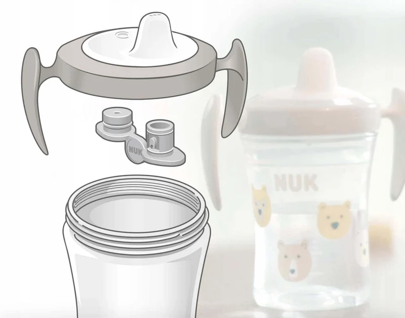 NUK Trainer Cup KUBEK NIEKAPEK lew i zebra 6 m+ 230 ml
